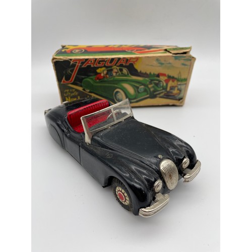 463 - VINTAGE JAGUAR SPORTS CAR TIN PLATE TOY