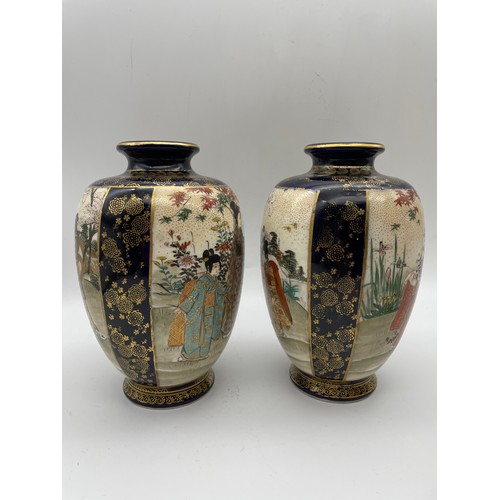 497 - PAIR OF JAPANESE SATSUMA VASES DECORATED WITH PANELS OF GEISHAS