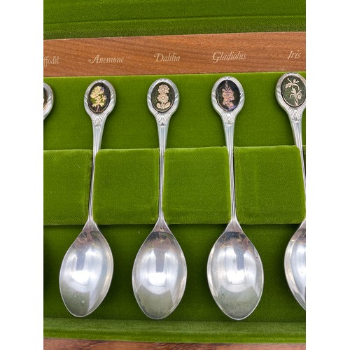 486 - CASED SET OF TWELVE SILVER ROYAL HORTICULTURAL SOCIETY FLORAL SPOONS