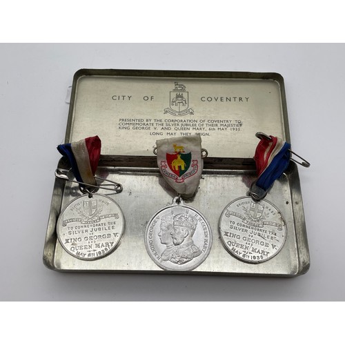 524 - SILVER JUBILEE COMMEMORATIVE TIN AND COVENTRY RELATED MEDALS