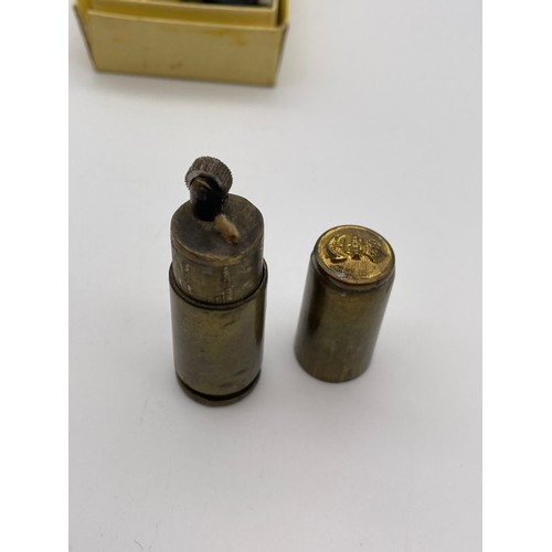 467 - TRENCH ART LIGHTER FASHIONED FROM A SHELL CASE AND BOX OF A SELECTION OF ROYAL NAVY BUTTONS