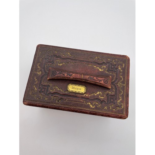 461 - EMBOSSED LEATHER KEYBOX WITH PURPLE LINER