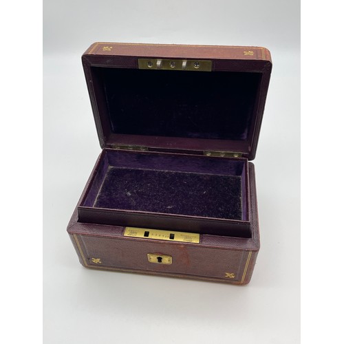 461 - EMBOSSED LEATHER KEYBOX WITH PURPLE LINER