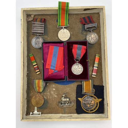 472 - MOUNTED BOARD OF MEDALS AWARDED TO PTE H. ELLWOOD INCLUDING SOUTH AFRICA CONSTABULARY, INDIA GENERAL... 