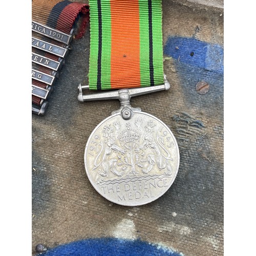 472 - MOUNTED BOARD OF MEDALS AWARDED TO PTE H. ELLWOOD INCLUDING SOUTH AFRICA CONSTABULARY, INDIA GENERAL... 