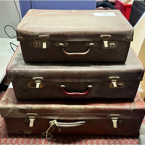 586 - THREE BROWN LEATHER CASES CONTAINING LOCOMOTIVE MODEL AND ACCESORIES INC. BOXED HORNBY AND TRACK