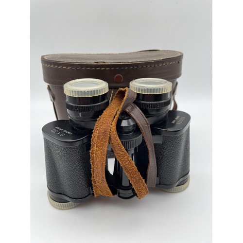 516 - CASED PAIR OF BOOTS 8X30 BINOCULARS