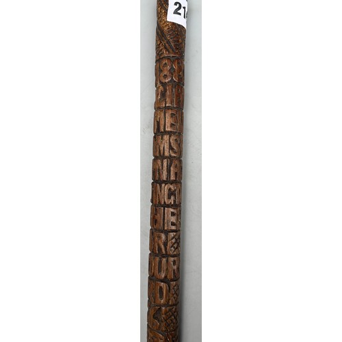 216 - INTERESTING CARVED WOODEN WALKING STICK DATED WITH NAME AND RELIGOUS TEXT (SANS HANDLE)