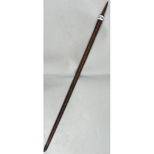 216 - INTERESTING CARVED WOODEN WALKING STICK DATED WITH NAME AND RELIGOUS TEXT (SANS HANDLE)