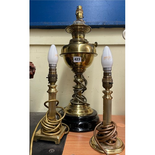 423 - BRASS ELECTRIFIED OIL LAMP AND TWO MATCHED COLOUMN TABLE LIGHTS