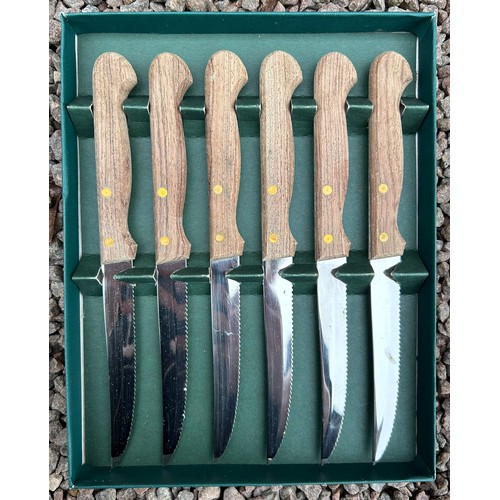 450 - PIGEON HOLE OF CASED CUTLERY INCLUDING STEAK KNIVES AND SERVING SET