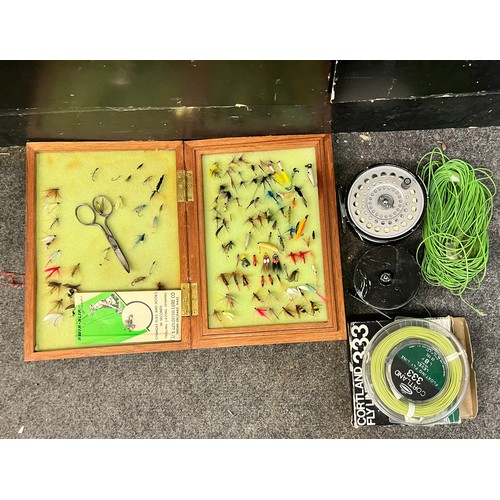 238 - WOODEN CASE OF WET AND DRY FISHING FLIES, CENTRE PIN REELS X 2, AND FLOATING FLY LINE