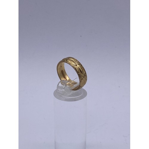 531 - 9CT GOLD RING WITH SURFACE DECORATION 3.7G APPROX SIZE M