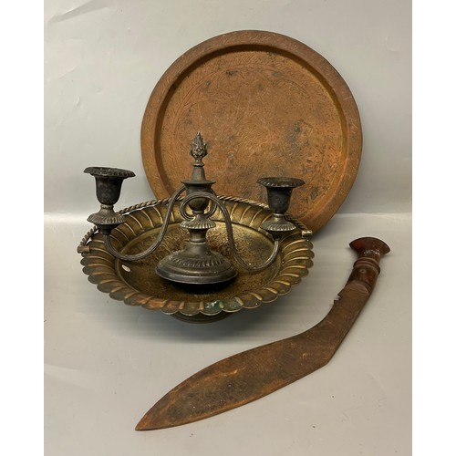 596 - EASTERN ENGRAVED COPPER DISH, KUKRI DAGGER, PEDESTAL BOWL WITH SWING HANDLE AND A SMALL CANDELABRUM