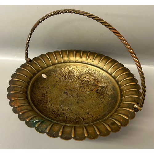 596 - EASTERN ENGRAVED COPPER DISH, KUKRI DAGGER, PEDESTAL BOWL WITH SWING HANDLE AND A SMALL CANDELABRUM