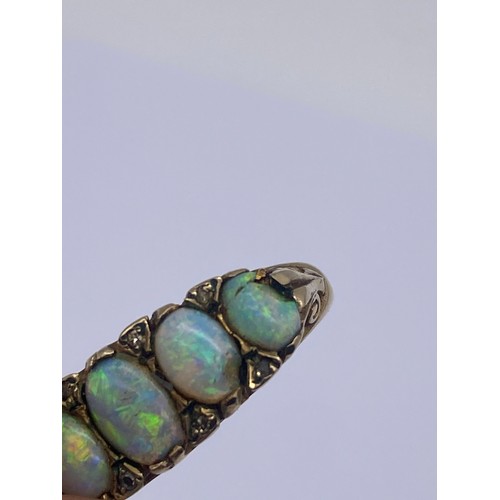 609 - 9CT FIVE STONE OPAL AND DIAMOND CHIP RING 5.6G OVERALL SIZE O