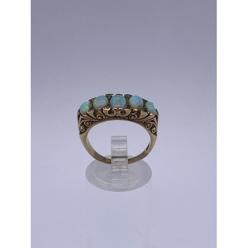 609 - 9CT FIVE STONE OPAL AND DIAMOND CHIP RING 5.6G OVERALL SIZE O