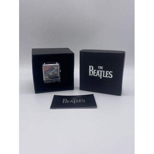 575 - BOXED OFFICIAL THE BEATLES RUBBER SOUL COVER FACE QUARTZ WRISTWATCH