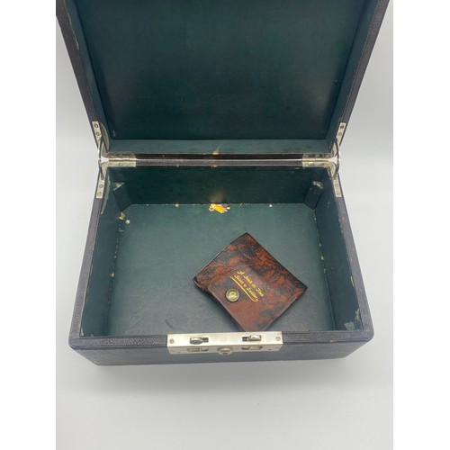 599 - LEATHER JEWELLERY BOX WITH GREEN INTERIOR CONTAINING FLORAL ENCRUSTED BROOCH AND EARRINGS, CHAINS AN... 