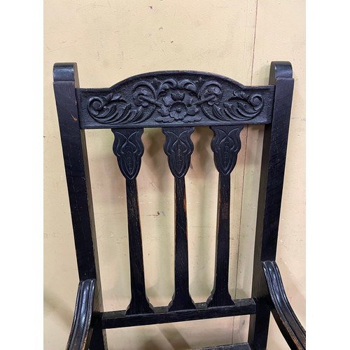 50 - LATE 19TH CENTURY BLACK OAK CARVED ELBOW CHAIR