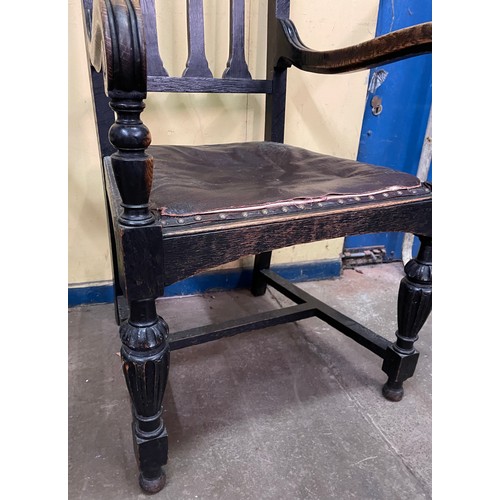 50 - LATE 19TH CENTURY BLACK OAK CARVED ELBOW CHAIR