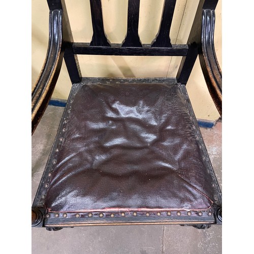 50 - LATE 19TH CENTURY BLACK OAK CARVED ELBOW CHAIR