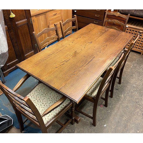 67 - OAK REFECTORY TRESTLE END DINING TABLE AND SIX LADDER BACK CHAIRS