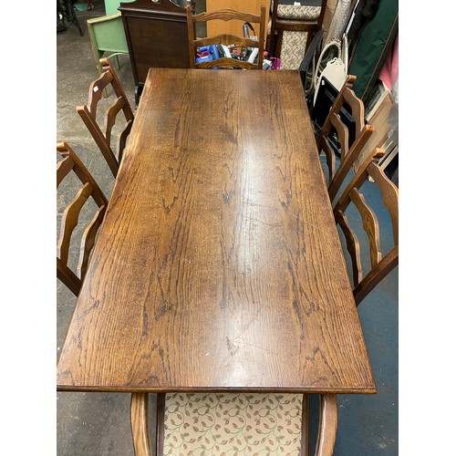 67 - OAK REFECTORY TRESTLE END DINING TABLE AND SIX LADDER BACK CHAIRS