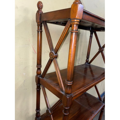 20 - REPRODUCTION GEORGE III STYLE MAHOGANY THREE TIER WOTNOT FITTED WITH TWO BASE DRAWERS