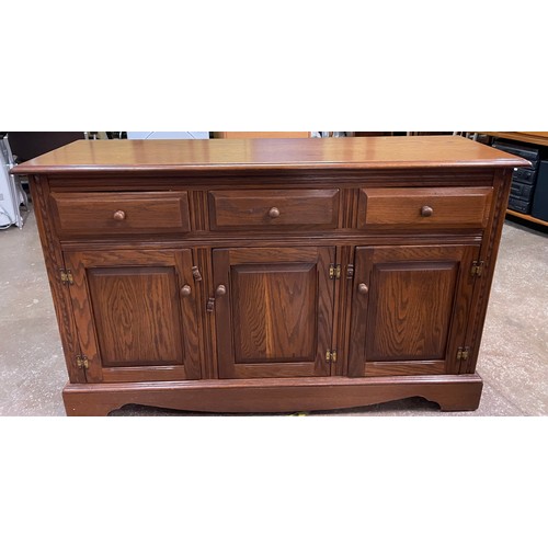 93 - JAYCEE OAK THREE DOOR DRESSER BASE