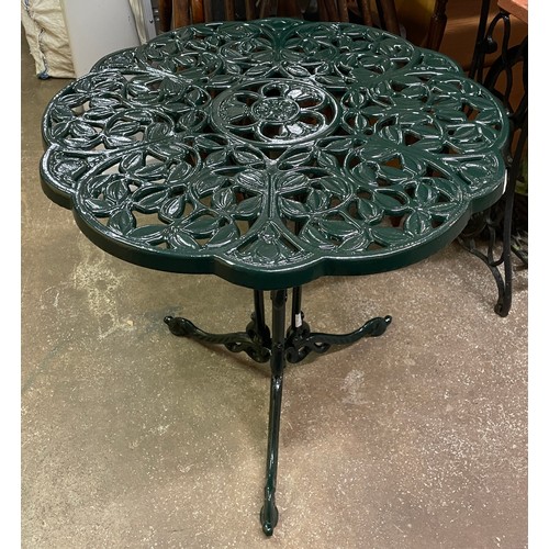 86 - GREEN PAINTED WROUGHT IRON VICTORIAN STYLE PATIO TABLE