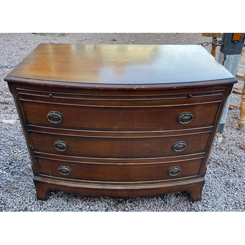 100 - REPRODUCTION GEORGE III STYLE BOW FRONT CHEST OF THREE DRAWERS WITH BRUSHING SLIDE