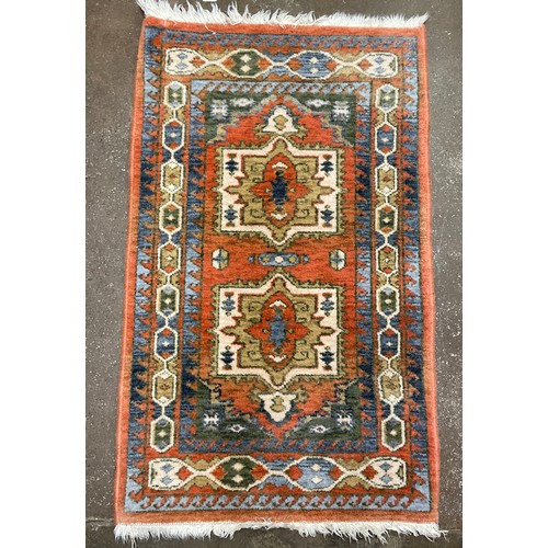 229 - SMALL TERRACOTTA FRINGED GEOMETRIC PATTERN RUNNER