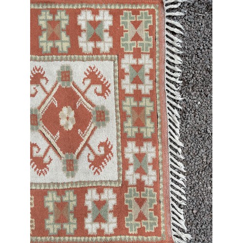 235 - 20TH CENTURY CARPET RUNNER WITH LOZENGE AND GEOMETRIC PATTERNS 86CM X 136CM APPROX