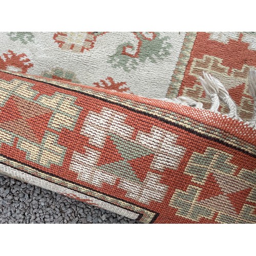 235 - 20TH CENTURY CARPET RUNNER WITH LOZENGE AND GEOMETRIC PATTERNS 86CM X 136CM APPROX