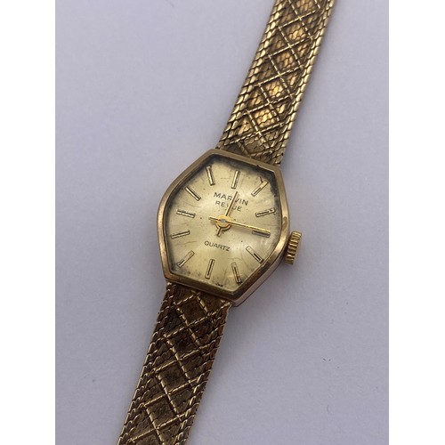 766 - 9CT LADIES MARVIN REVIEW QUARTZ WRISTWATCH ON TEXTURED LATTICE STRAP 16.7G OVERALL APPROX