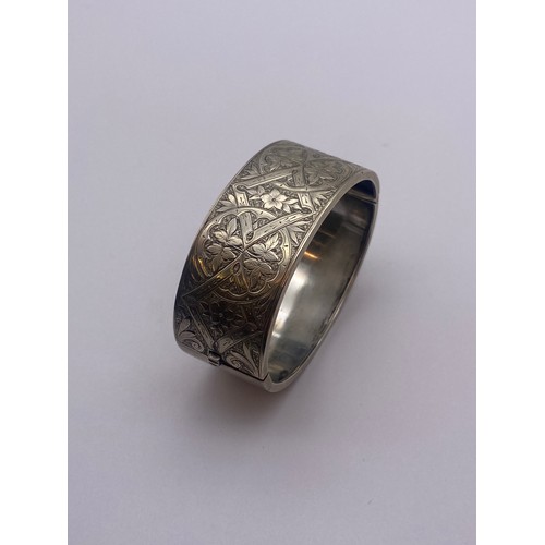 757 - UNMARKED WHITE METAL ENGRAVED CUFF BANGLE