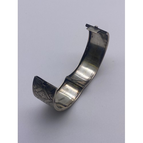 757 - UNMARKED WHITE METAL ENGRAVED CUFF BANGLE