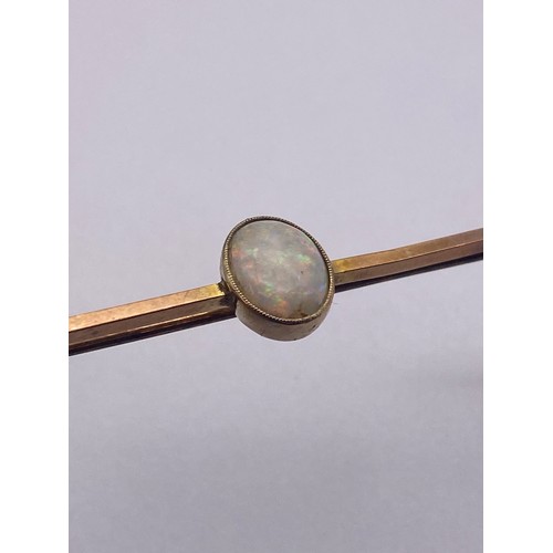 786 - 9CT ROSE GOLD BAR BROOCH WITH OVAL OPAL CABOCHON CENTRE AND SAFETY CHAIN 2.6G APPROX