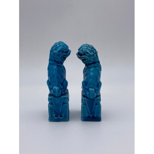 721 - PAIR OF CHINESE TURQUOISE GLAZED FOO DOGS