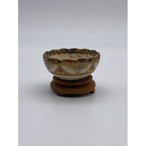 714 - JAPANESE SATSUMA EARTHENWARE BOWL AND ONE OTHER BOWL DECORATED WITH FIGURES