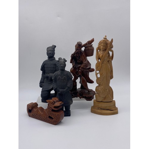 718 - TWO CHINESE TERRACOTTA ARMY  WARRIOR FIGURES, CARVED ROOT WOOD FIGURE OF A FISHERMAN, AND DRAGON STA... 