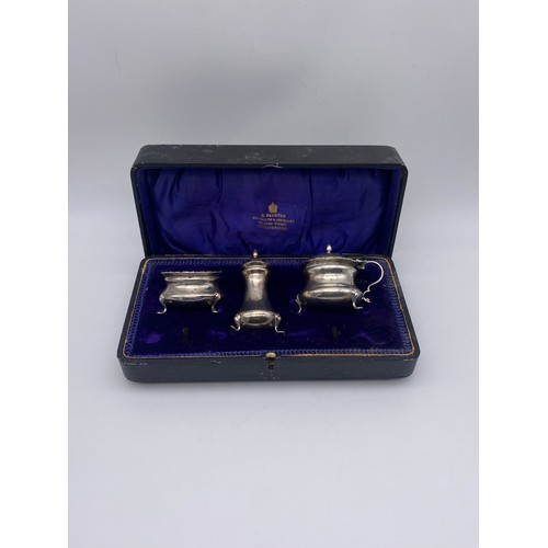 669 - BIRMINGHAM SILVER THREE PIECE CRUET SET