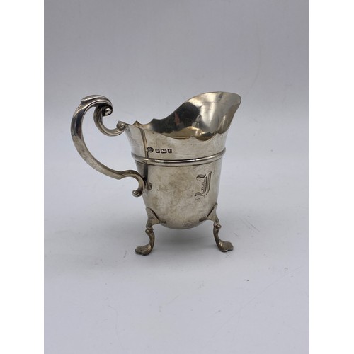 659 - SHEFFIELD SILVER CREAM JUG WITH SCROLL HANDLE