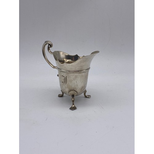 659 - SHEFFIELD SILVER CREAM JUG WITH SCROLL HANDLE