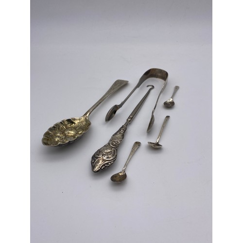 674 - LONDON SILVER BERRY SPOON, PAIR OF GEORGIAN SILVER SUGAR TONGS, SILVER HANDLED BOOT HOOK AND THREE S... 