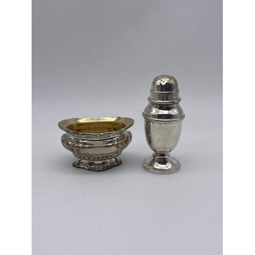 662 - BIRMINGHAM OVOID SILVER PEPPERETTE AND SILVER PARCEL GILT PEDESTAL SALT