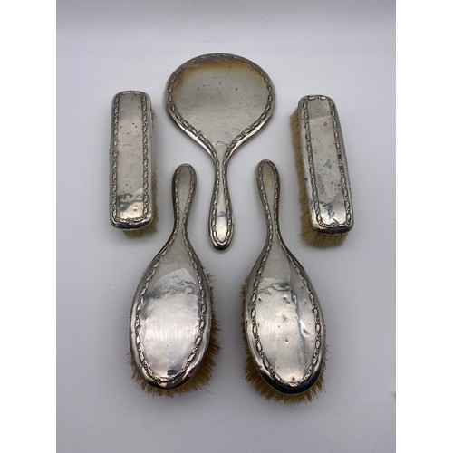 661 - SILVER BACKED DRESSING TABLE, HAND MIRROR AND BRUSHES