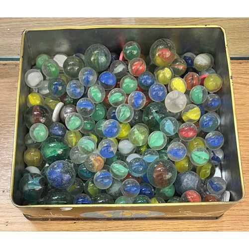 744 - VINTAGE TIN OF GLASS MARBLES