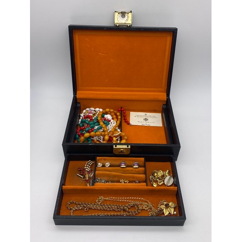 773 - BOX CONTAINING COSTUME JEWELLERY INCLUDING PLATED NECK CHAINS, BROOCHES, CHARM BRACELET, BEADS